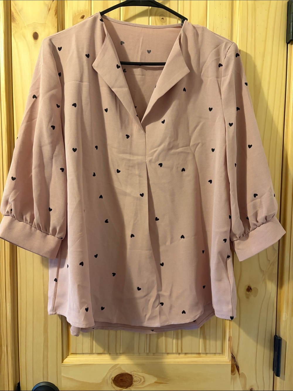 Women’s pink top with hearts